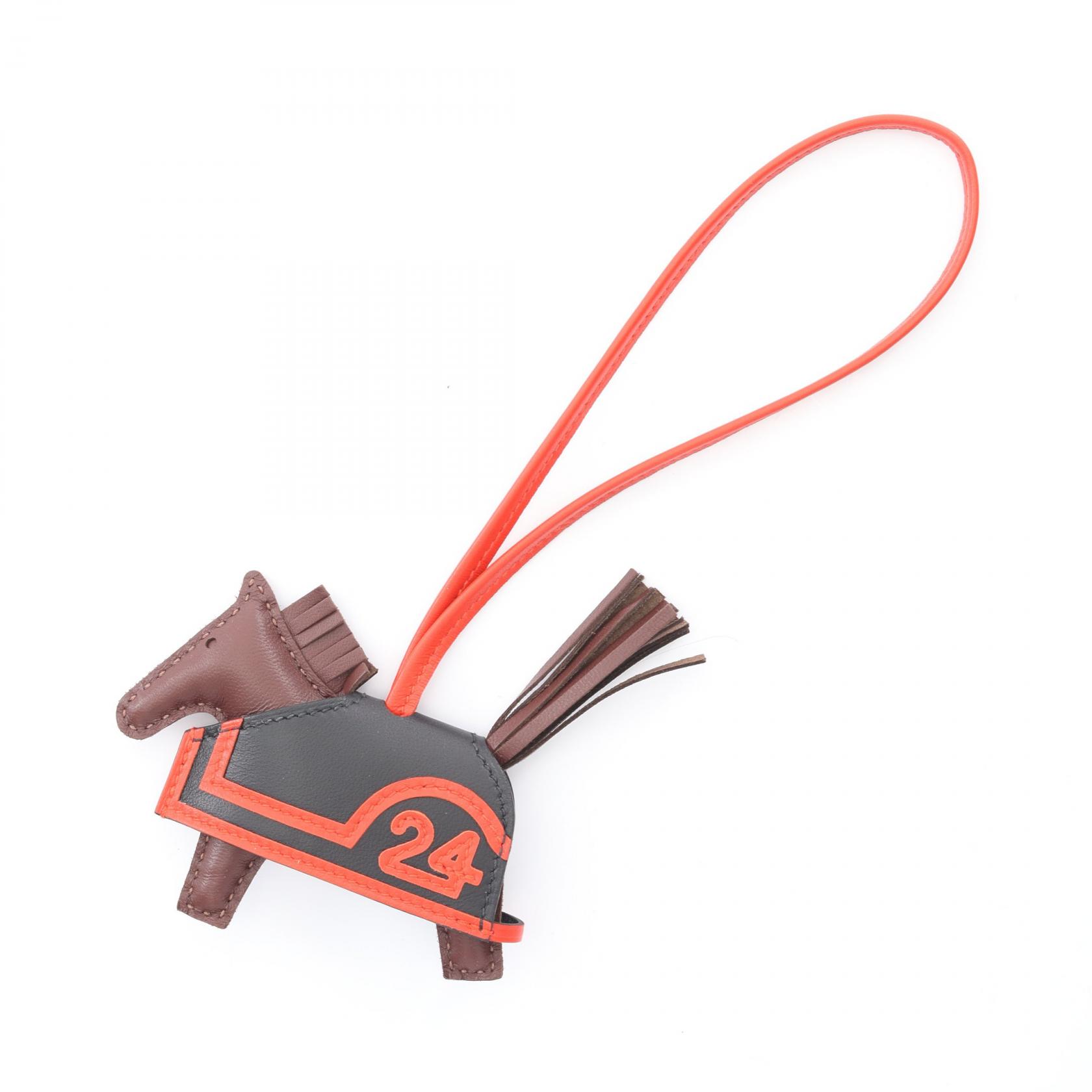 エルメス HERMES ロデオPM ロベオクール チャーム アクセサリー レザー アニョーミロ / ヴォースイフト アニョーミロ ブラウン系 / レッド系 / ブラック系/ カプシーヌ 【中古】