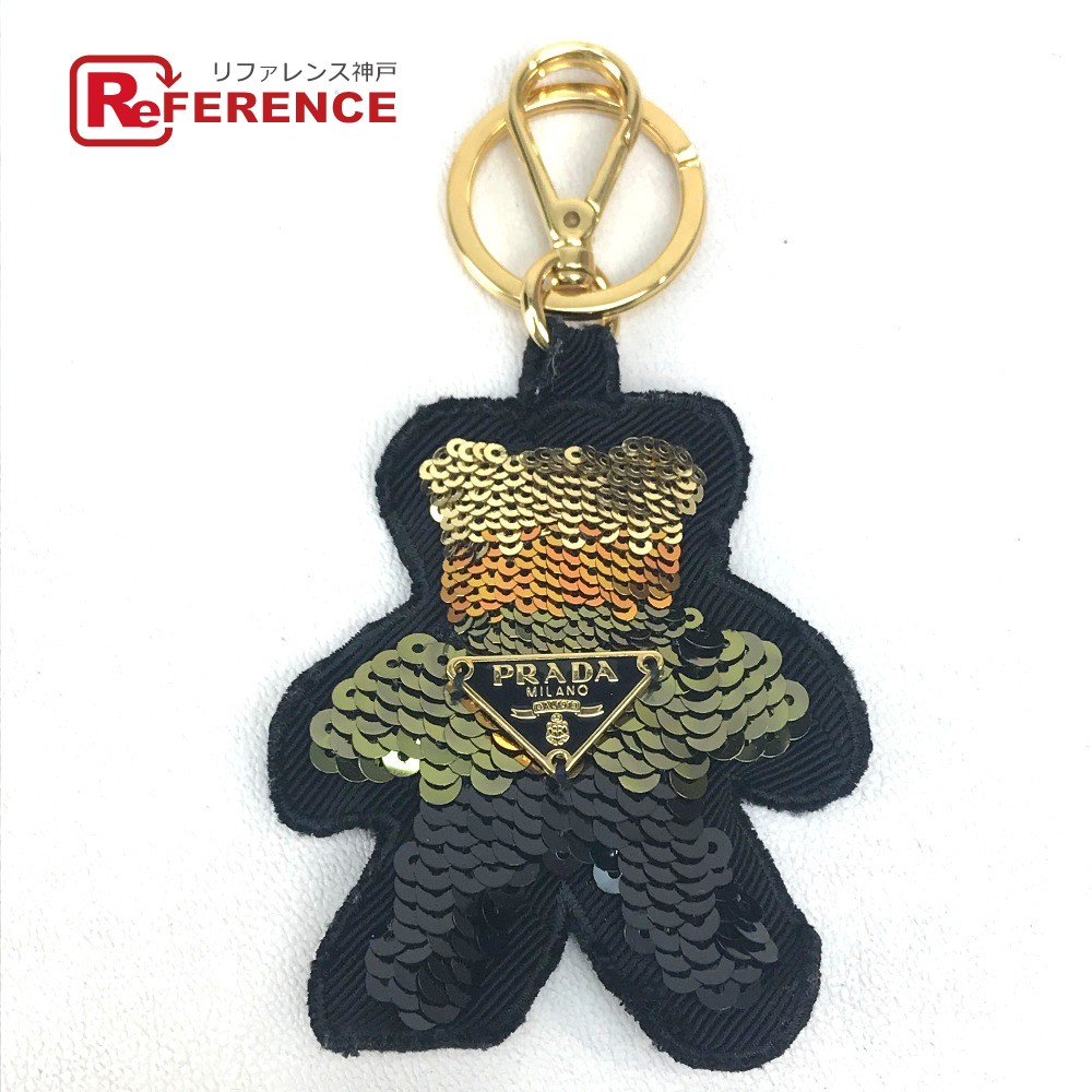 PRADA プラダ 1ARA67 三角ロゴプレート クマ モチーフ ベア スパンコール キーホルダー ファブリック スパンコール レディース ORO 1 ブラック×グラデーション
