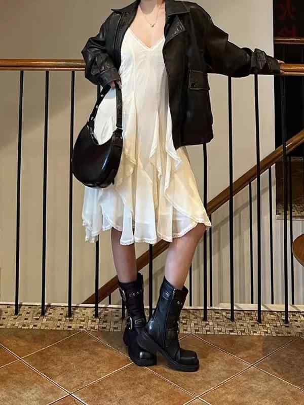 衣装 成人女性用 仙垂感 不規則 スピード競技 花辺 新款 シフォン  無袖 V素っ首 百搭 吊帯 御召しもの 軽さ 通気性 太陽面爆発影ぼうし 花柄 刺しゅう 春夏 普段使い走り 会う約束 女子らしい トップス