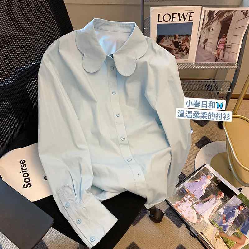 フランスの 青い 子供の 襟の シャツレディース 春の 長袖の 新型の ファッションの の 感の 独特な シャツ