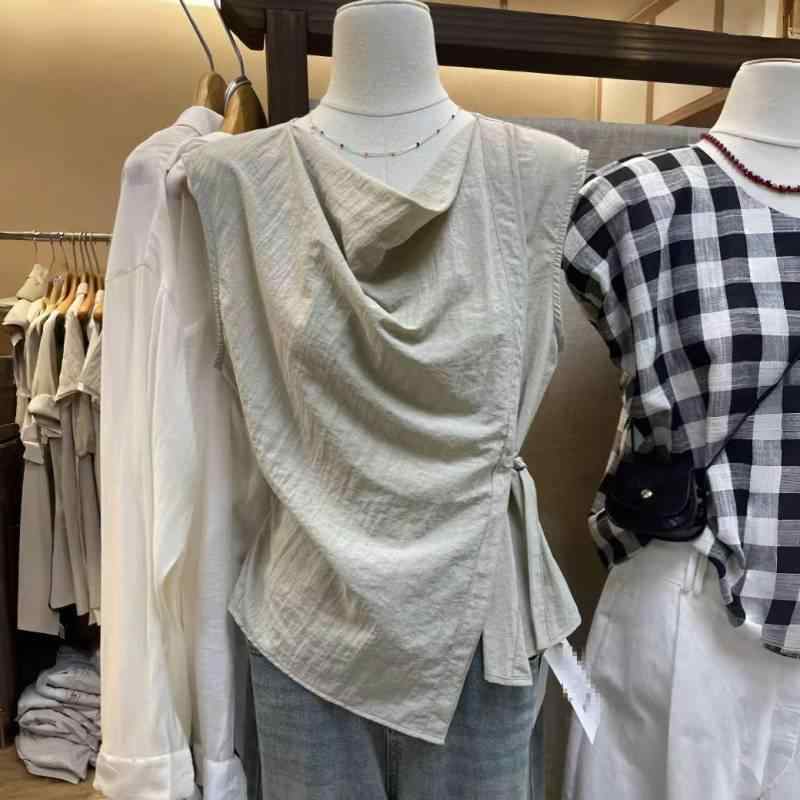 夏服 女性用 2025年 デザイン性 マイナー 無袖 シャツ 系帯 ウエスト引き締め 揺れ襟 不規則 トップス 軽量 コットン素材 春夏 通勤用 普段使い ブラック ピンク系 アイボリー Vネック ビッグシルエット 吸湿速乾 伸縮性