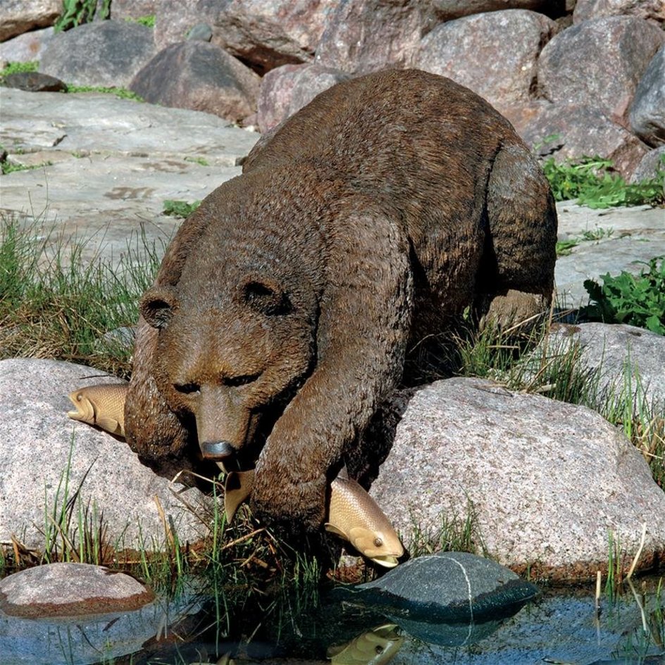 北方民族博物館公式サイト：北方民族の文化 鮭背負い熊【ガラス目