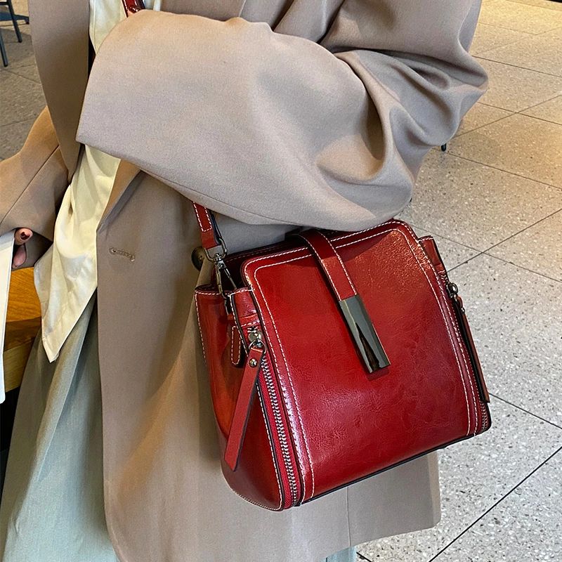 マイナーデザイン ハンドル付きバケツバッグ おしゃれ 高級感 本革 クロスボディバッグ|RSショップ店