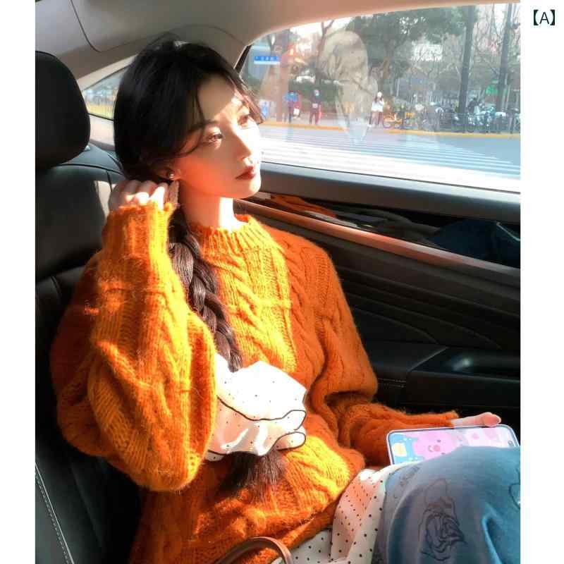 レディース ニット セーター シック白を引き立てるオレンジカラーのねじれ花柄ツイストニットセーターはレディース丸襟プルオーバーセーターです。厚手で外側に着用できます。
