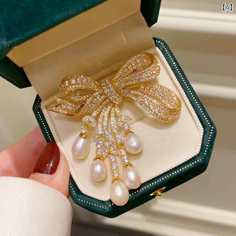 アクセサリー　パール　ジュエリー 淡水 パールの リボン ブローチ ハイエンドの 精巧 ファッション コサージュ 軽い 高級 感と コート アクセサリー