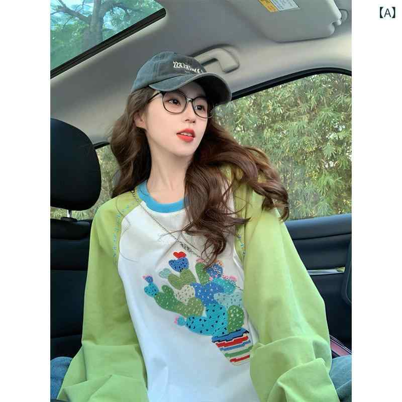 カットソー レディース おすすめ カットソー レディース おすすめ ハート プリントの ラグラン 長袖 Tシャツ レディース 2025 春の ユニークな ゆったり フィット 感 アメリカン カラー ブロッキング