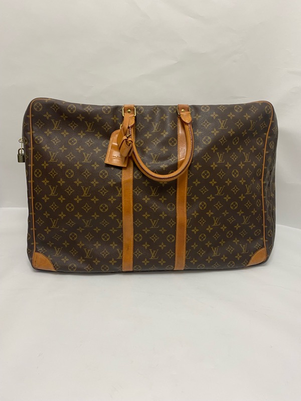 ヴィトン　シリウス　６０　M41402　LOUIS VUITTON　ルイ　ヴィトン　【中古】　中古BCランク　ゴム伸び有　中古品の為取り切れない汚れ傷あり　ポアニエ　ネームタグ　鍵付き　８５３
