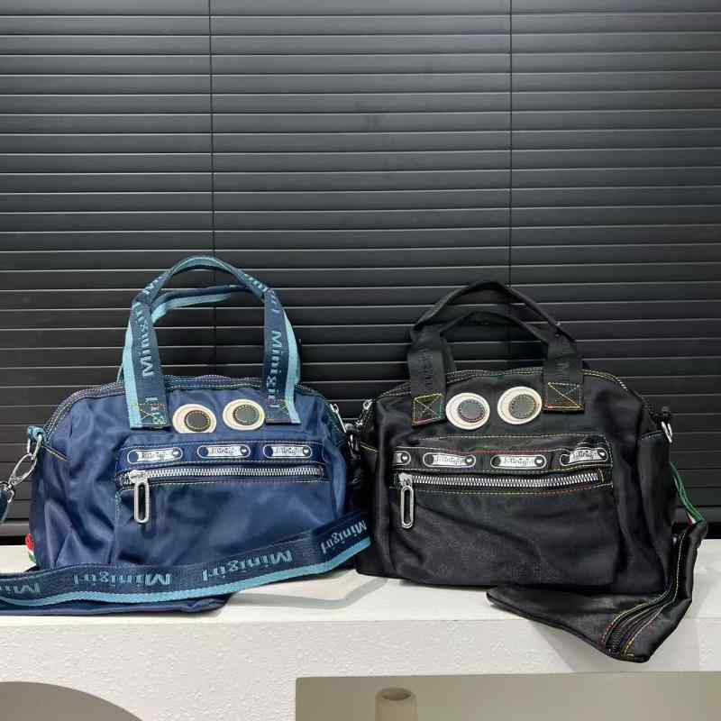 ハンドバッグ レディース 多ポケット ナイロン 大きな目 かわいい ユニーク 個性的 おしゃれ ファスナー開閉 2way 肩掛け 斜め掛け 手提げ鞄 カジュアル 日常使い 仕切り付き ミディアム 春夏 ブルー ブラック