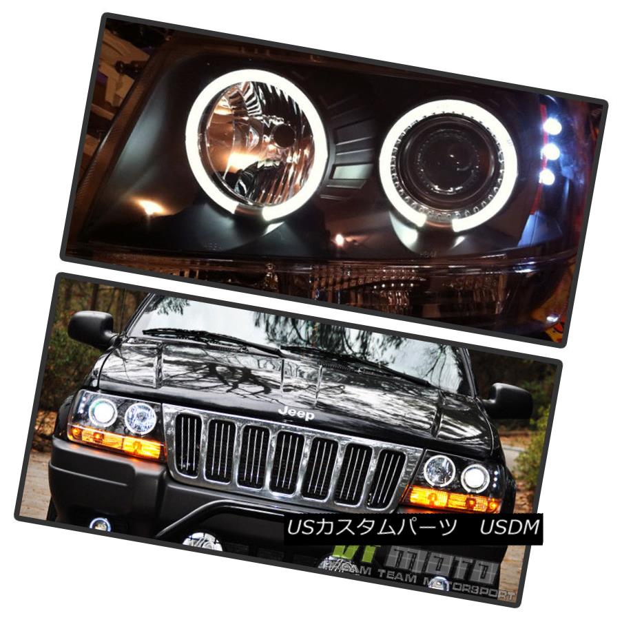ヘッドライト Black Housing Smoke Lens 99-04 Jeep Grand Cherokee Halo LED Projector Headlights ブラックハウジングスモークレンズ99-04 Jeep Grand Cherokee Halo LEDプロジェクターヘッドライト 【並行輸入品】