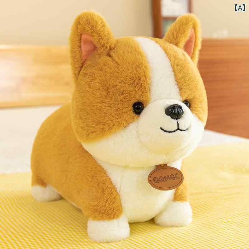 わんちゃん　人形　おもちゃ 人形 ぬいぐるみは かわいい 眠っている 桃の 人形を 落ち着かせます 短い 足の ラグドール 犬は コーギーを 抱きしめる 小さい ヒップ