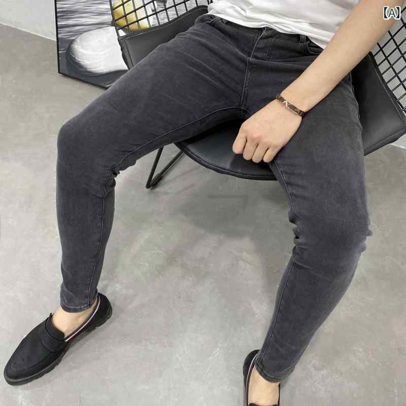 ウエスト ジーンズ メンズ ファッショナブルで 多 用途な グレーの スリムフィット デニムパンツ、 夏と 秋の 若者向けの 伸縮性の ある ミッドウエストの メンズパンツです。