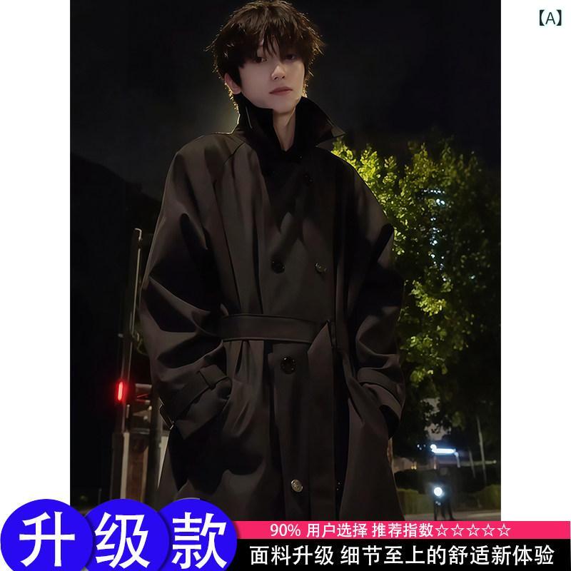 メンズトレンチコート春秋 英国 風 ダブルブレストの 黒の メンズ コート。 秋に ぴったりの クリーン フィットで、 高級 感の ある ハンサム ミドル 丈 トレンチコート。