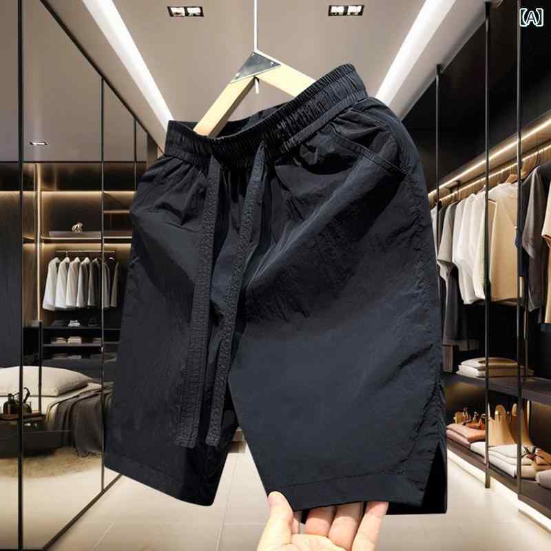 メンズショートパンツ 2025年 夏の新 スタイル メンズショート パンツ、 無地、 メンズ 5点 パンツ、 速 乾 ミドル 丈 パンツ、 アメリカン スタイル ルーズフィット、 カップル ビーチ パンツ
