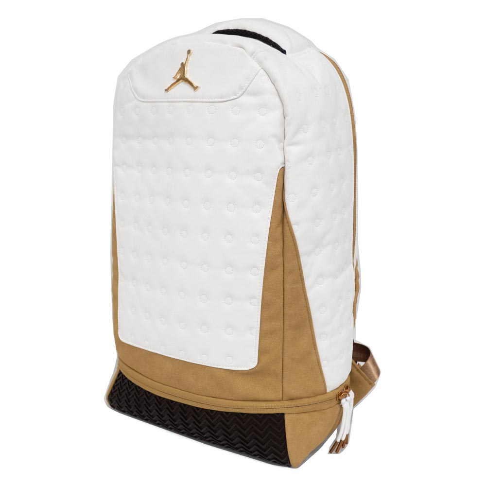 white and gold nike backpack