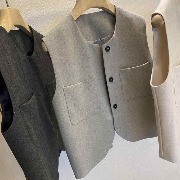 限りない レディース 通い 普段使い走り ノースリーブ テーラード ジレ ベスト トップス ゆったり ラウンドのど頚 ポリエステル 衣嚢付き添い人 入り合わせる色合い 黒いこと系 薄墨色系 象牙色 S M L