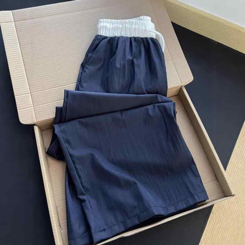 パンツ レディース ワイドレッグパンツ 紺色 ネイビー ポリエステル混紡 ゆったり ストレートパンツ スポーティ カジュアル 中厚地