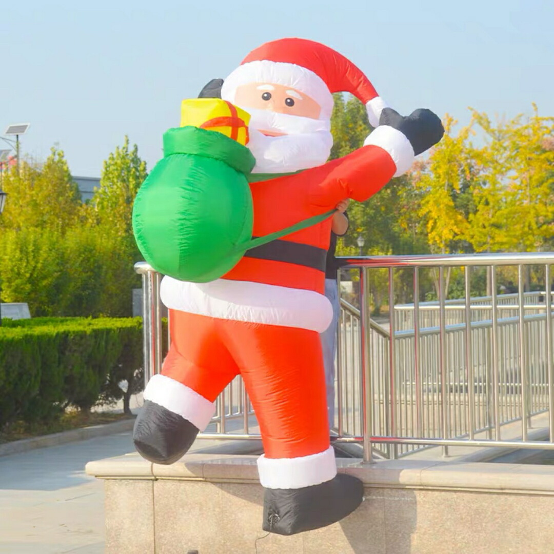クリスマス飾りつけ サンタさん 膨らます 出来事  庭 露天かざり付ける