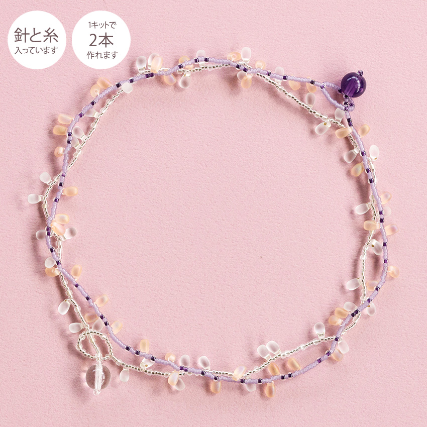 コーラルビーズネックレス REDMAN 大フェザー × コーラルビーズ ネックレス 左向き 先