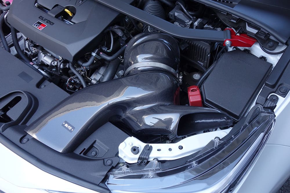 ブリッツ GRカローラ GZEA14H 後期 カーボンインテークシステム コアタイプ：A3 ステンレスメッシュ ケース素材：CFRP CARBON FRP 27038 BLITZ CARBON INTAKE SYSTEM カーボンインテークシステム｜シンシアモール 店