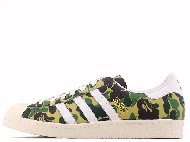 ADIDAS SUPER STAR 80S BAPE GZ8981\u003cBR\u003eアディダス オリジナルス はやりっ児 80s \"ア ベイシング エイプ\"" 緑であること ABC 家鴨/白いことGREEN ABC CAMO/WHITE"