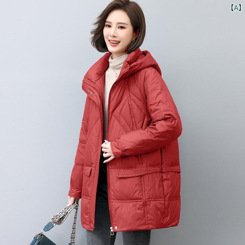 大きい サイズの ゆったりと した カジュアルな 中 長の ダウン ジャケットの 女性 2024 冬 服の 新型の お母さんの 服は 羽毛の 中年の コートに 似合います。