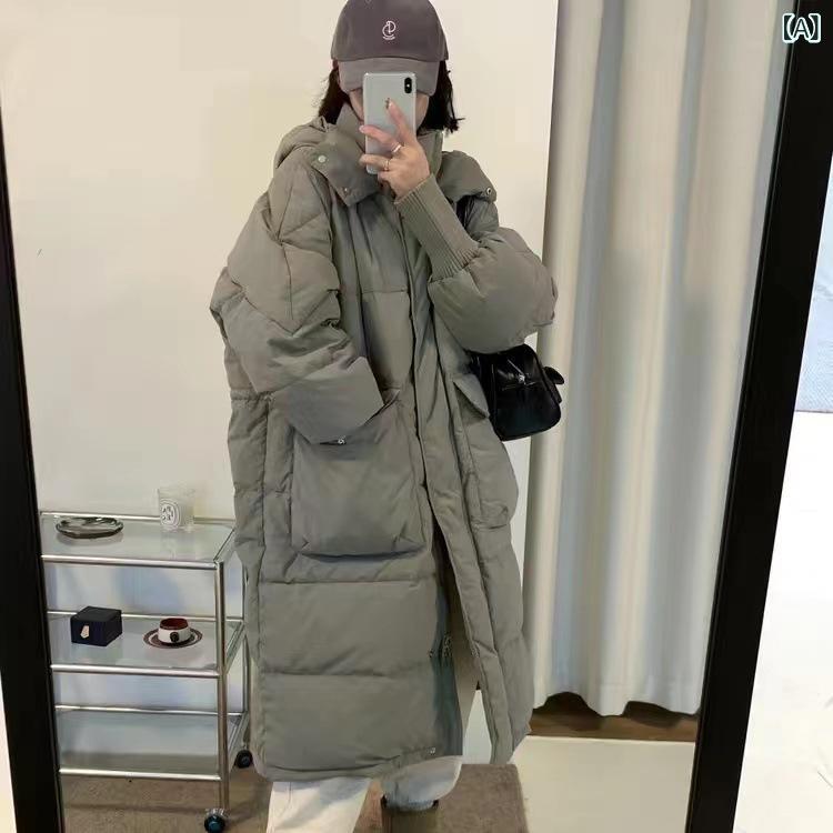 2024 新型 ダウン ジャケットの 女性の 中の 長 さの 韓国 風 ファッションは 帽子まで 厚くて ゆったり して います。
