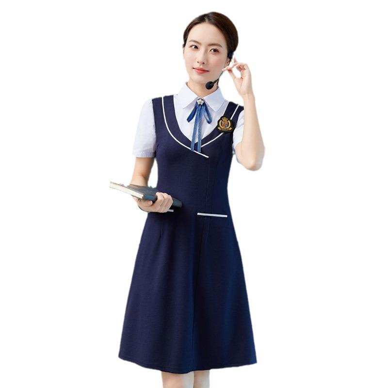 ワンピース レディース 幼稚園教諭 幼保関係者 制服 ユニフォーム 上品 半袖 春夏 面接 職業用 仕事着 通勤 オフィス フェイクレイヤード Aライン Vネック ショート丈 ポリエステル ネイビー