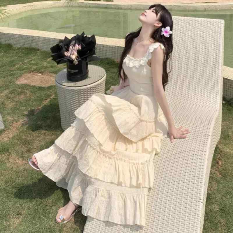 衣装 レディース 春夏 砂浜 たまり場 キャミソール ティアードスカート ロング マキシ丈 真四角のど首 フラウンス うしろ側明けっ広げ 無地 うつり変わり 女子らしい 愛くるしげ 今めかしい 象牙色 A生産ライン