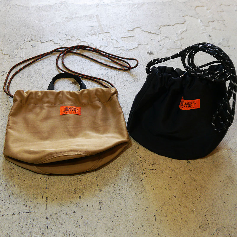 楽天市場 Universal Overall 巾着 バッグ ユニバーサルオーバーオール ポーチ ナイロン ワンショルダーバッグ 巾着ポーチ 巾着バッグ 巾着袋 バッグ ハンドバッグ クラッチバッグ Uvo 023 黒 ブラック ワークウェア ブランド 世田谷ベース ミニマリスト Squeeze Coconuts