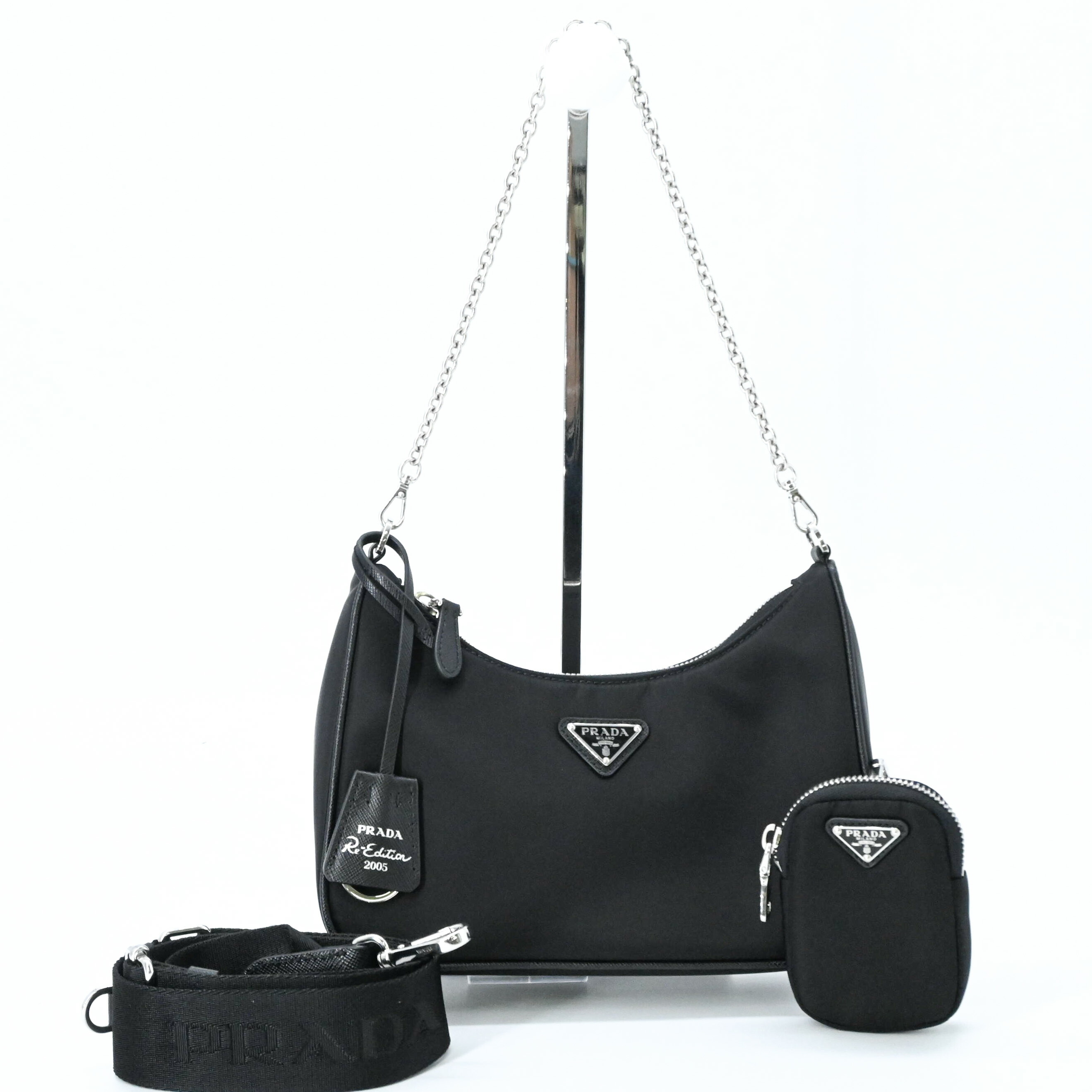 【未当て嵌める品】PRADA プラダ  Re-Edition 2005ナイロン なめし革 肩口 合切袋付き添い人 ハンドバック 2WAY レディース ３角形ロゴタイプ 黒いこと 黒 しろがね色金具 白付け札 バッグ-レディースバッグ