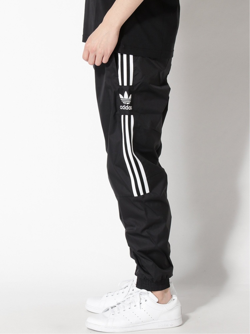 red and black adidas sweatpants