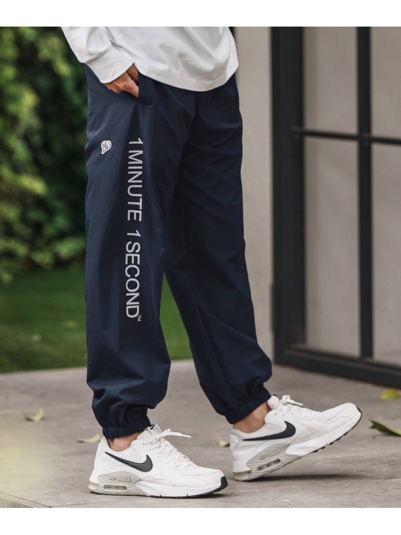 1minute 1second mp13847-cotton like nylon training pants with logo print ナイロンパンツ カンビオ パンツ その他のパンツ グレー ブラック ネイビー【送料無料】