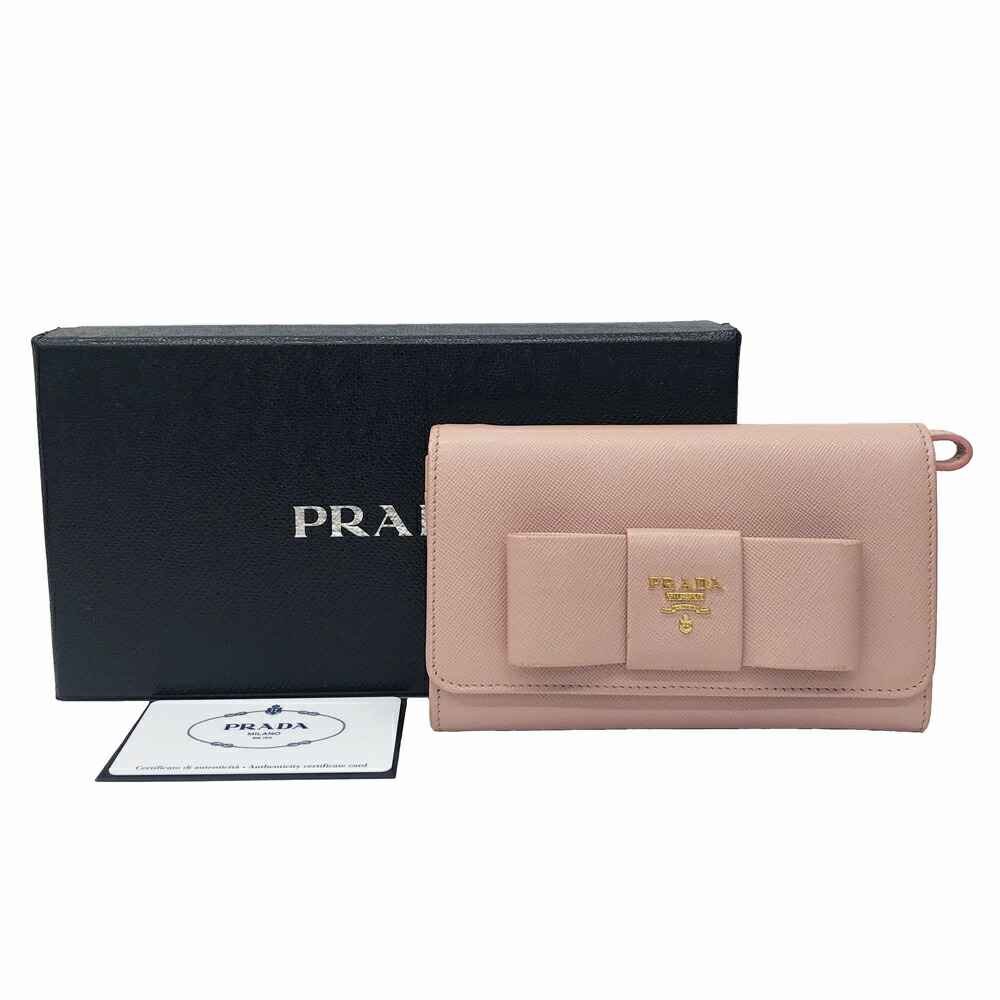 美品⭐️✳︎PRADA ✳︎ SAFFIANO FIOCCO 長財布 楽天市場】【財布】PRADA プラダ リボン モチーフ 2つ折 長財布