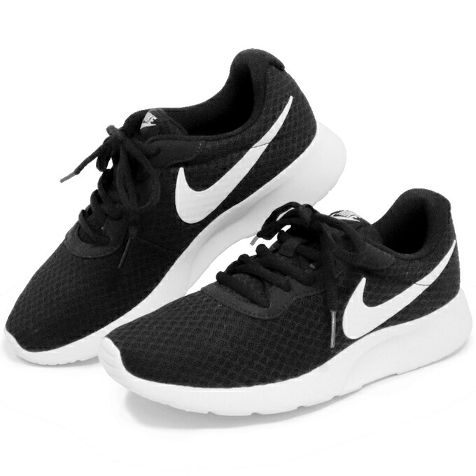 ladies black nike trainers with white sole