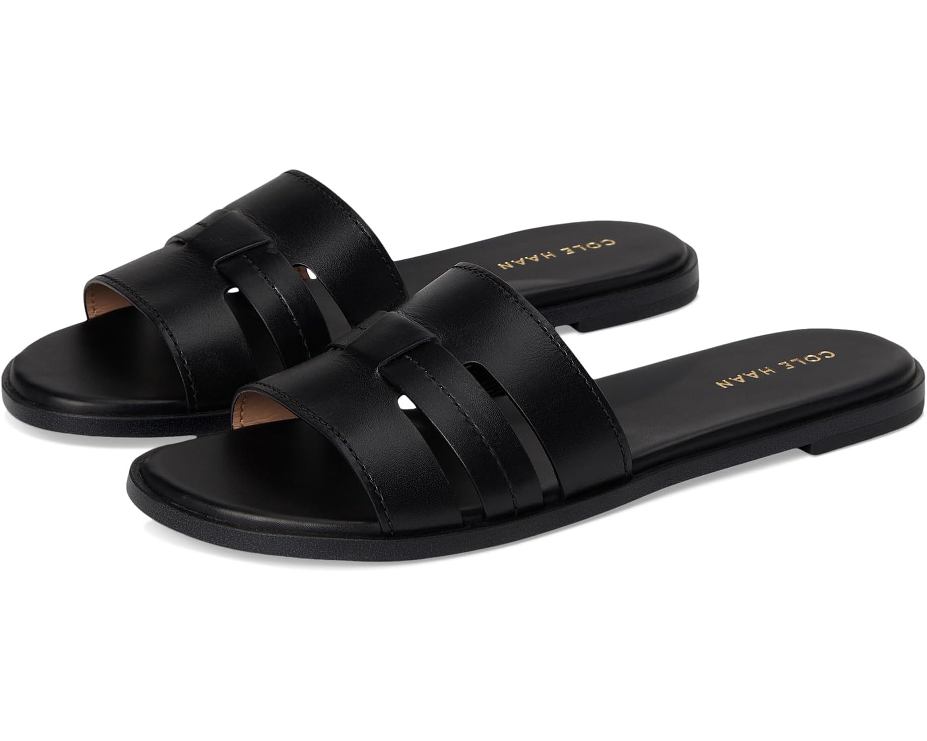 (取寄) コールハーン レディース フリン スロッテド スライド Cole Haan women Flynn Slotted Slides Black Leather｜スウィートラグ