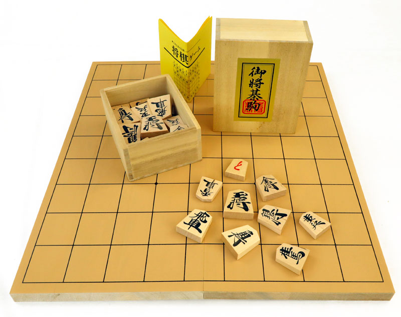 楽天市場】木製将棋セット 新桂5号折将棋盤セット プラ将棋駒歩