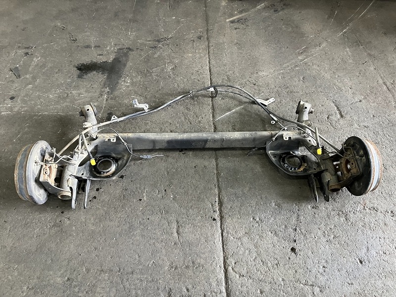【中古】 マーチ NK13 リアアクスルビーム X FOUR Vセレクション 4WD 55501-1HB1A NAH