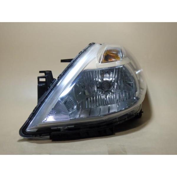 【中古】コーティング済 ティーダ C11 左ヘッドランプ・ヘッドライト 15M スタンレー P7779 26060-1JY0A B20