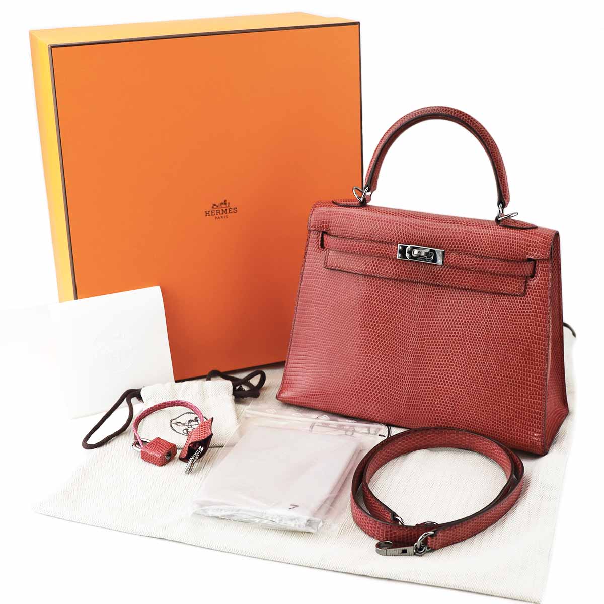 Hermes エルメス Kelly ケリー25 リザード リセ フューシャ ピンク　ルテニウム金具 □I刻印 ストラップ【送料無料】【代引き無料】 ピンク赤 ハンドバッグ【中古】24310801