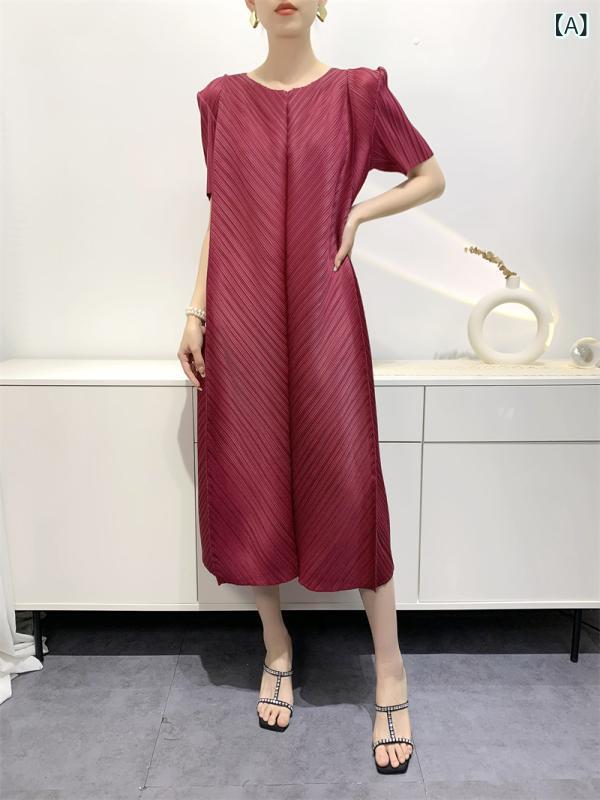 しわの ワンピースの 女性は 斜めに 百の スカートを 押して、 中の 長 さの ゆったり して いる カジュアルな 百の スカートの 2023 夏の 新型を つなぎ 合わせます。｜Tanzan
