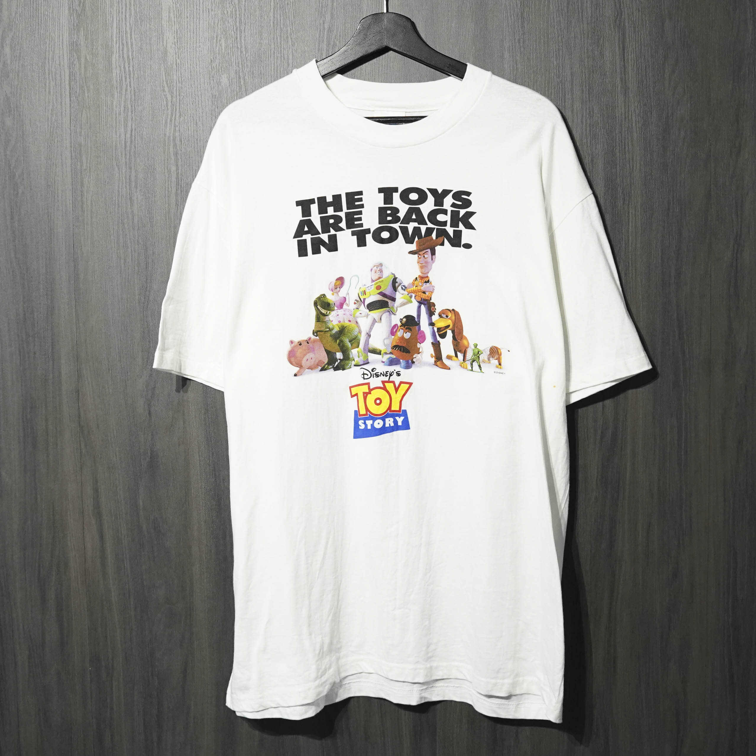 ヴィンテージ 古着　キッズ トイ・ストーリー Tシャツ 赤 トイ・ストーリー - ウッディー Tシャツ 赤 L ピクサーのひみつ