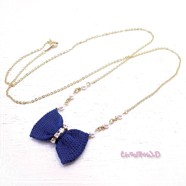 ニット素材 リボンの形のネックレス Knit Ribbon Necklace Ｃｈ*eM+W:D[チェムダブリュディー]