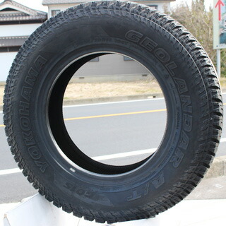 AT
