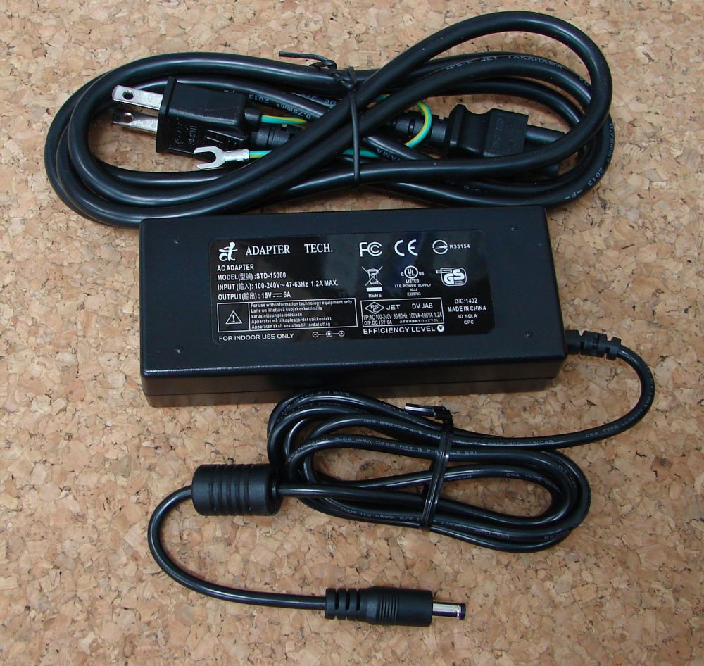 外国で/国内 スイッチング ＡＣアダプタ  STD-15060 15V 6.0A DC繋ぎ（見て呉れ5.5粍口径2.1粍）（AC有線テレビ1.8ｍ付き添い人）