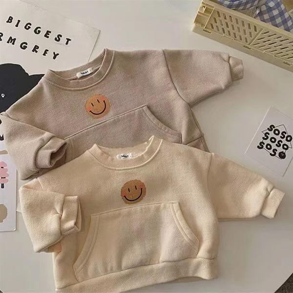 子供服 スウェット ベビー服 男女兼用 長袖トップス 杏色 カーキ 大口ポケット かわいい笑い顔デザイン 綿100% 普段着 部屋着 春秋