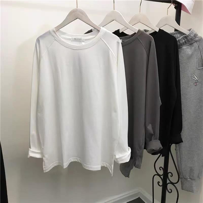 長袖 Tシャツ 女性用 秋冬 韓国風 インスピレーション 肩落とし 袖 ゆったり スリム サイドスリット 百搭 インナー トップス 綿素材 純色 セットイン 長袖 ルーズフィット ミドル丈 クルーネック 開叉デザイン 気質 通勤 都市スタイル 快適 ゆっ