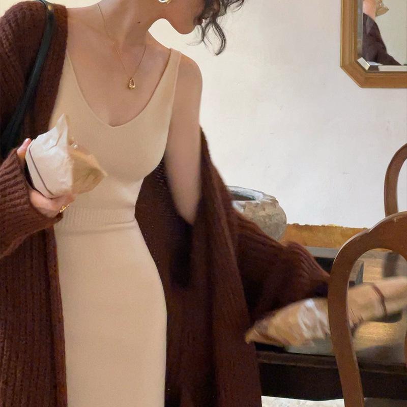 ワンピース レディース ニット 吊り帯 無袖 黒 高腰 開叉 ミドル丈 包みスカート 秋冬 気質 通勤 純色 長め セクシー 背中開き 復古 フレンチスタイル