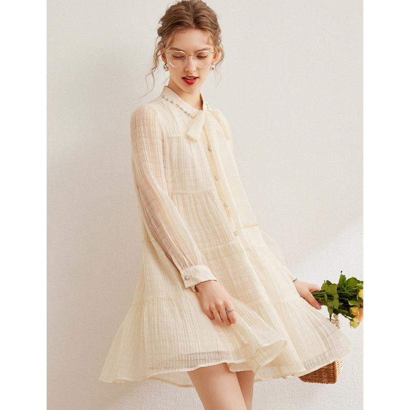 春夏 ワンピース 女性用 かわいい Aライン 長袖 セットインスリーブ 中長丈 甘め プリーツ 加工 蝶結び 装飾 ビーズ 装飾 天竺 コットン 素材 純色 杏色 ゆったり 腰回り ストリート スタイル 単品 セットアップ トップス ワンピース スカート