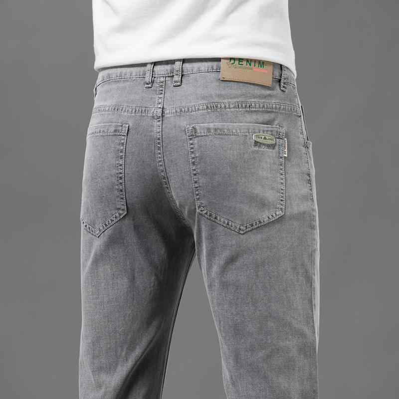 メンズ デニムパンツ 直筒型 コットン素材 ミッドライズ ゆったりシルエット 長丈 ストレッチ 吸湿速乾 水洗加工 ライトブルー ネイビーブルー グレー系 普段使い 秋冬 カジュアル 男性用 ジーンズ ボトムス 通勤 通年対応 軽量 快適フィット