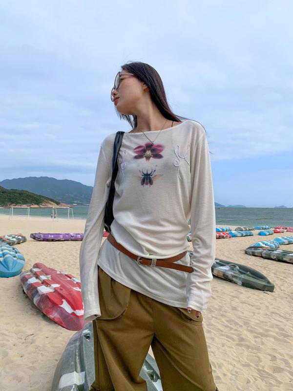 Tシャツ レディース 春夏 白 長袖 肩出し ボートネック 切り替え 花柄 甲虫 プリント 街頭 ストリート カジュアル 中長丈 ポリエステル 吸湿速乾 軽量 個性 ファッション トップス インナー レイヤード コーディネート 日常使い